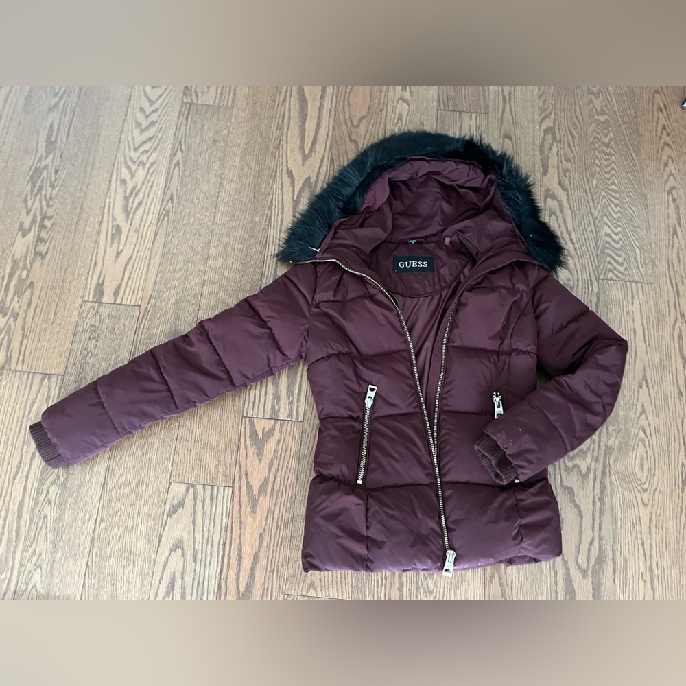 Guess puffer in dark purple.